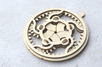 laser cut wooden mechanical iris with geared mechanism