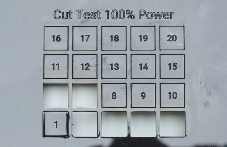 Test cut on 3mm black acrylic with 100% power and different speed settings for the xTool D1 Pro 20W (no air assist)