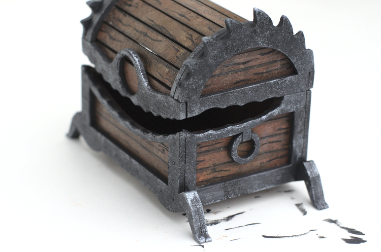 Creepy looking laser cut Halloween chest, with the eye and teeth still missing.